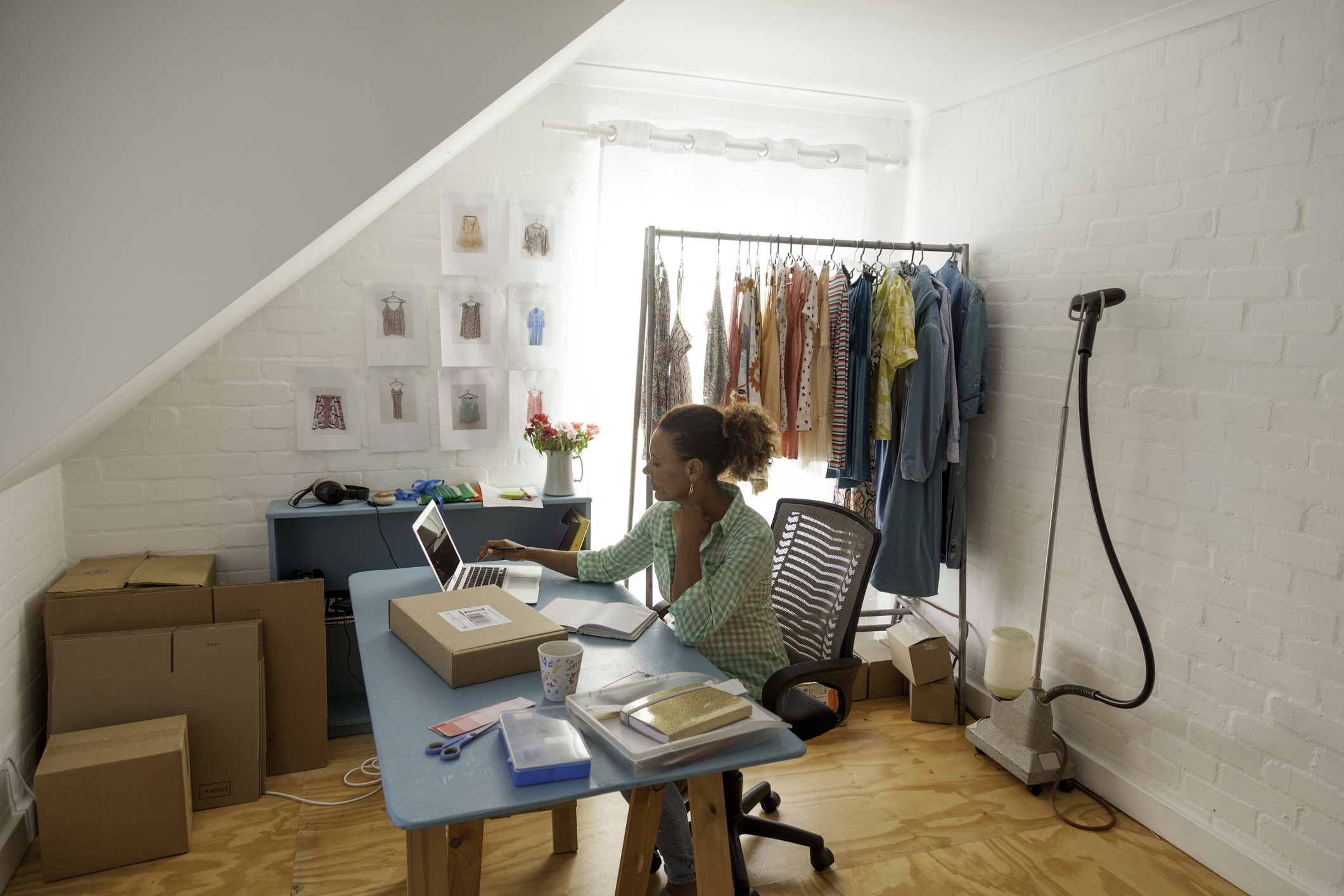 Mature woman working from an office in her home